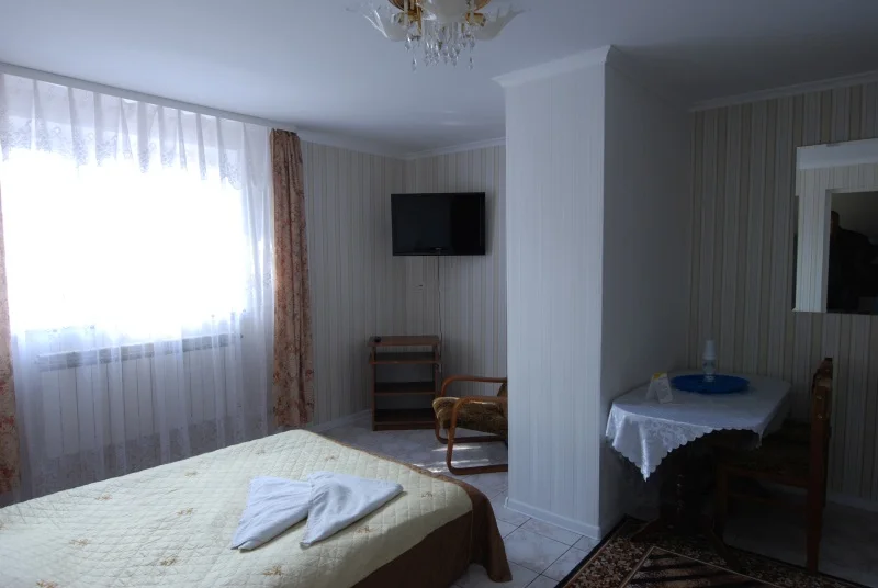 Šviesus viešbučio kambarys